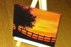 Tree-and-fence-orange-sky